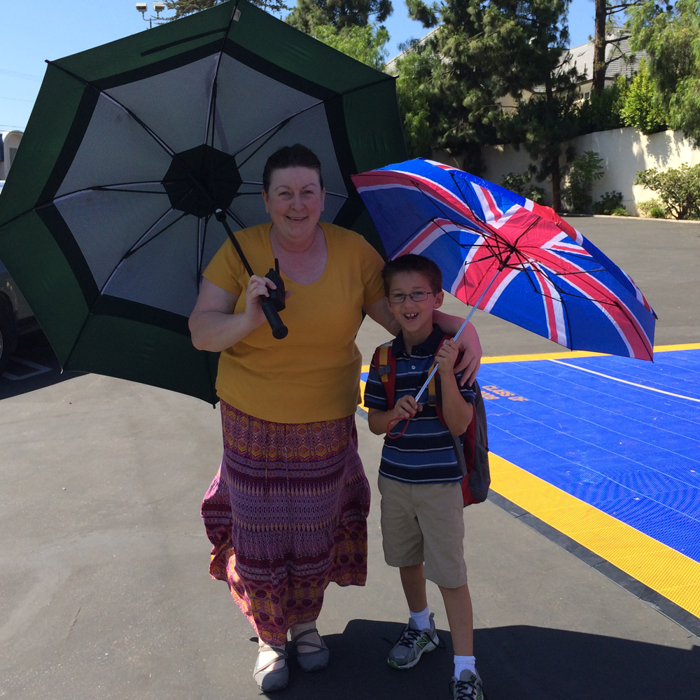 Ethan won the opportunity to "Be Ms. Cindy for the Day" and he loved helping out his classroom teaching assistant grading papers and calling out carpool names.
