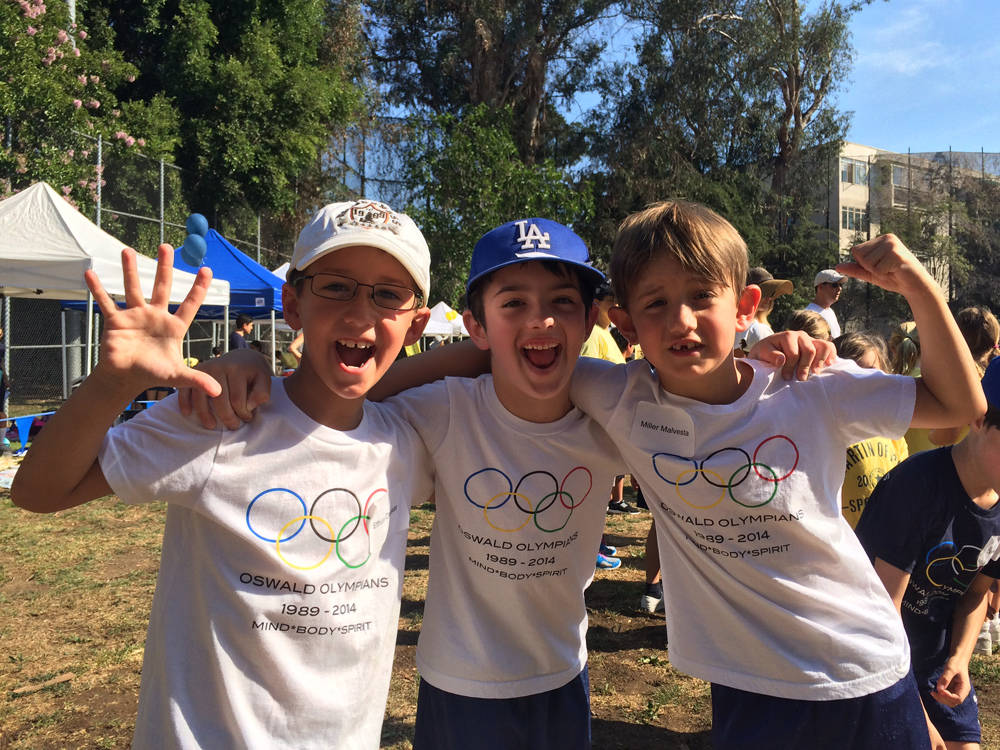 Ethan's gripping tug-o-war battle helped Team White came in first place at Sports Day. E was so excited!